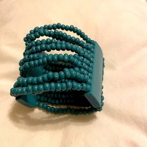 Gender neutral turquoise beaded bracelet.